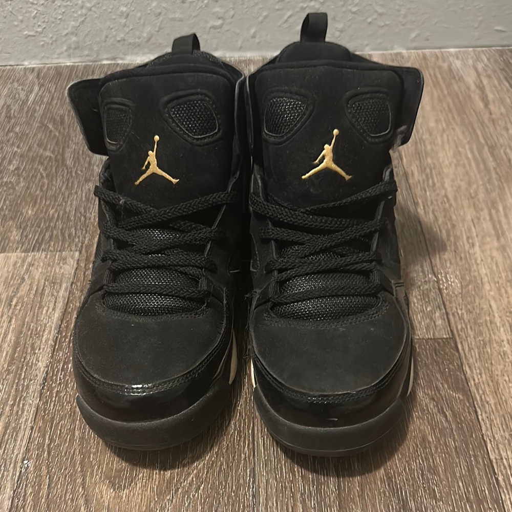 Air Jordan Black and Gold Sneakers
